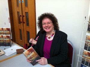 Signing copies of 'A Murder in Michaelmas' at Trinity College Bristol